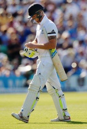 England's Ben Stokes looks dejected as he leaves the field after being dismissed.

