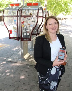 Telstra Country Wide area general manager Larissa Redford at a Wi-Fi hotspot on Alinga Street.