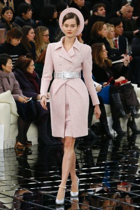 A pink tweed skirt suit that seemed to be inspired by Jackie Kennedy.
