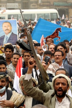 Supporters of the General People's Congress - the party of deposed president Ali Abdullah Saleh - rally against air strikes in Sanaa. 