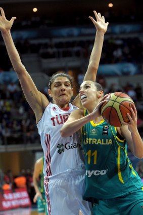 Laura Hodges (right) played a crucial role as the team's starting power forward and a mentor to the six players in their first major tournament.