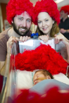 Beau and Katie Green with their son Patrick.