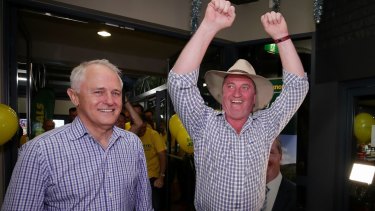Prime Minister Malcolm Turnbull and New England candidate Barnaby Joyce celebrate at Barnaby Joyce's election night party.