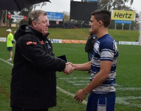 Phil Gould congratulates Nathan Cleary after a schoolboy match in 2014.