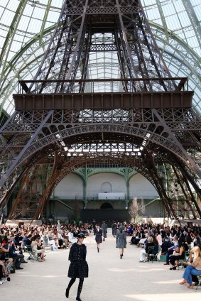 A casual replica of the Eiffel Tower at Chanel. 