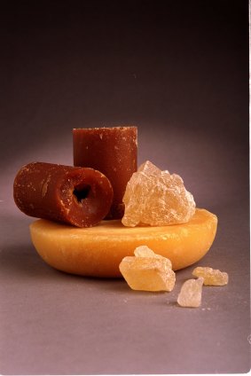 Sugar rocks: coconut sugar cylinders, disc of palm sugar and yellow rock sugar. 