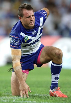 Tough Dog: Josh Reynolds winces after a tackle during the match between the Canterbury Bulldogs and the Parramatta Eels at ANZ Stadium.