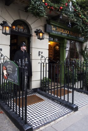 A policeman stands at the entrance to the Sherlock Holmes Museum, at the mythical 221B of Baker Street in London, United Kingdom, dedicated to the famous detective.