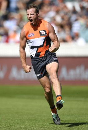 Steve Johnson of the Giants celebrates kicking a goal during the round two AFL match between the Greater Western Sydney Giants and the Geelong Cats at Manuka Oval on Sunday.