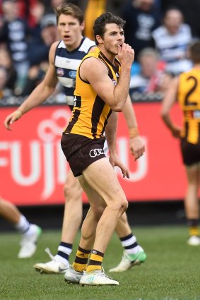 Hawthorn's Isaac Smith reacts after missing a shot on goal in the dying seconds of the match against Geelong on Saturday. 