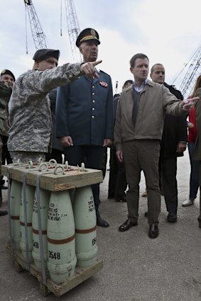 US Ambassador to Lebanon David Hale, right, speaks with US military personnel during a handover ceremony of weapons to the Lebanese army in Beirut on Sunday.