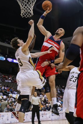 Hammering one down: Marcin Gortat dunks on Pelicans counterpart Omer Asik.