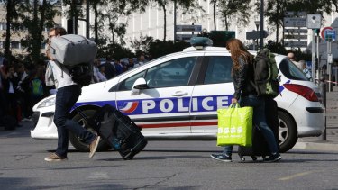 Passengers are stopped from entering Marseille's Saint-Charles training station.