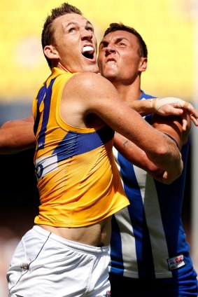 Eagle Drew Petrie and Roo Braydon Preuss contest an old-style, one-on-one ruck.