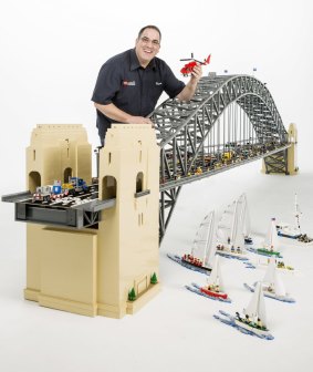 Australia's only certified Lego professional Ryan McNaught and his model of the Sydney Harbour Bridge.