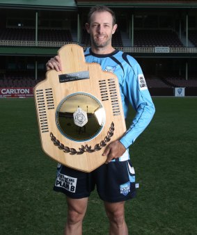 No substitute for the real thing: NSW cricketer Ben Rohrer displays the poor cousin of the Sheffield Shield.