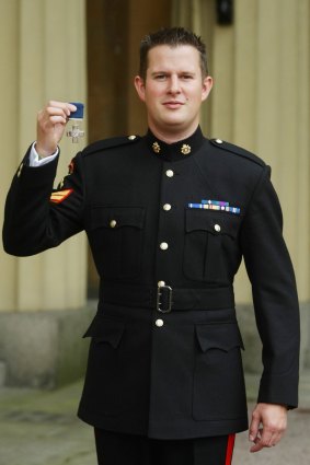 Kim Hughes receiving his George Cross in 2010.