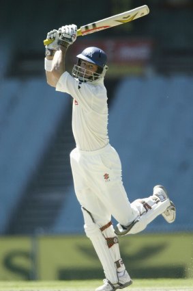 Consumed: Matthew Elliott in action for the Bushrangers in 2004 at the MCG.