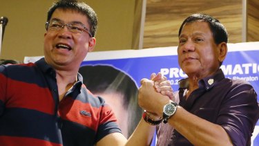 Mayor Rodrigo Duterte, right,  is officially declared the presidential candidate of the PDP-Laban political party by its president, senator Aquilino "Koko" Pimentel, in November last year. 