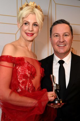 Kate Peck (left) and Matthew White after Bathurst 1000 won a Logie for the Most Outstanding Sports Coverage.