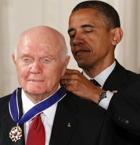 President Barack Obama awards the Medal of Freedom to former astronaut John Glenn at the White House in 2012.
