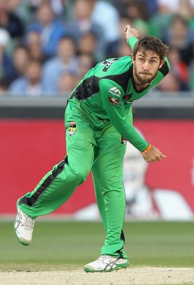 Glenn Maxwell bowls during the match against the Sydney Sixers.