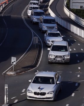 The Prime Minister's new BMW leads a convoy during the G20 in Brisbane.
