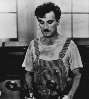 Charlie Chaplin in a scene from the 1936 film Modern Times.