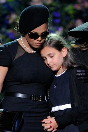 Janet Jackson (L) comforts Michael Jackson's daughter Paris Katherine Jackson during the Michael Jackson public memorial service in 2009 in Los Angeles.