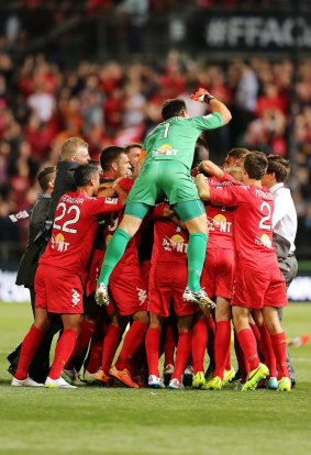 Time to celebrate: Adelaide United claimed their first silverware in seven years.