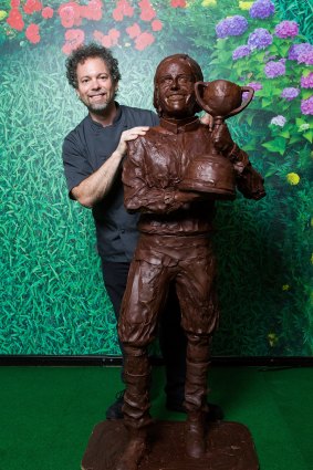 Paul Joachim with his chocolate sculpture of jockey Michelle Payne at the Cake, Bake and Sweets Show at the Melbourne Convention and Exhibition Centre.