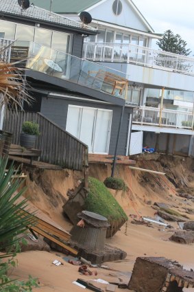 After the big storm, Tony Cagorski's   Collaroy house hangs precariously off the dunes.