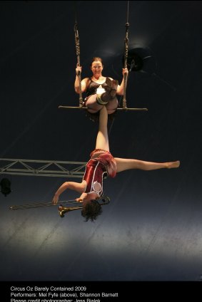 An upside down Mel Hannon in 2009 during her heyday under the big top.