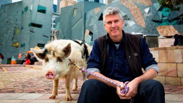 Matthew Evans and piggy friend at Federation Square in Melbourne.