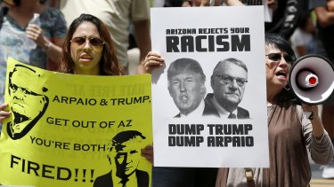 In Arizona, Trump aligned himself with controversial police official Joe Arpaio.