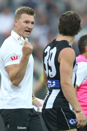Rare run: Magpies coach Nathan Buckley speaks to Nathan Freeman during a NAB Cup match.