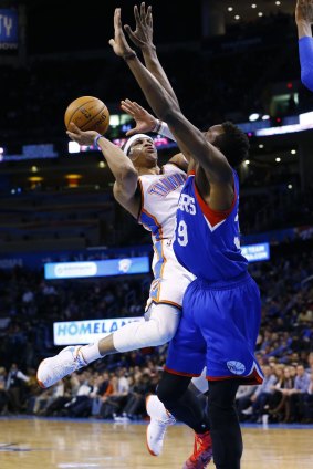 Fearless: Oklahoma City Thunder guard Russell Westbrook shoots as Philadelphia 76ers forward Jerami Grant defends.
