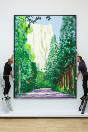 Installers put the finishing touches on the NGV's summer blockbuster exhibition of works by British artist David Hockney, which opens next week. This is Yosemite II, all works were drawn on an iPad. 