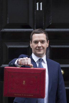 'I think there are things I did that did make a difference': George Osborne holds the chancellor's red despatch box outside 11 Downing Street in 2015.