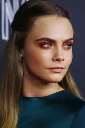 Cara Delevingne working a rusty eye at the Australian premiere of Paper Towns.