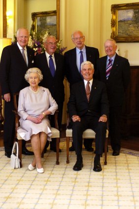 Queen Elizabeth II sits with Governor-General Michael Jeffery with (standing L to R) former governors-general Peter Hollingworth, Bill Hayden, Sir Ninian Stephen and Sir William Deane in Canberra, 2006.