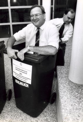 Bill Stefaniak helps Liberal colleague Tony DeDomenico to launch their policy on bins in the 1990s.