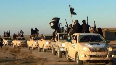 Islamic State militants in convoy in Syria.