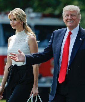 Ivanka and Donald Trump on the White House lawn.