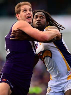 Tapout: Eagles' ruck Nic Naitanui contests a boundary throw in against  Aaron Sandilands of the Dockers.
