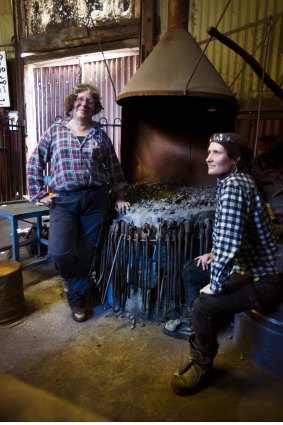 Photograph Simon O'Dwyer. The Age Newspaper.180815. Photograph Shows. For five years, Mary Hackett (left) has run Blacksmith Doris, a monthly blacksmith training sessionb only for women. One of her students Alice Garrett, loved it so much she is now starting to work as a paid blacksmith.