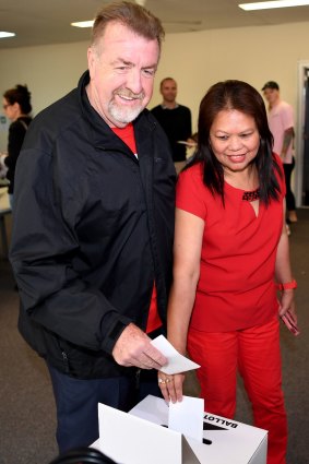 Ipswich's former acting mayor Paul Tully, with his wife Liza, as they voted on Saturday.