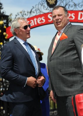 Trainer Mike Moroney (right) chats with owner Rupert Legh after the presentation for the Antler Luggage Handicap.