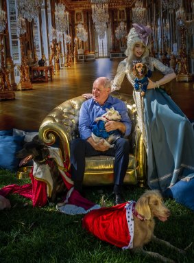 NGA director Gerard Vaughan, Marie Antoinette (aka Claire Mackey) and canine friends, dressed up like French royalty.
