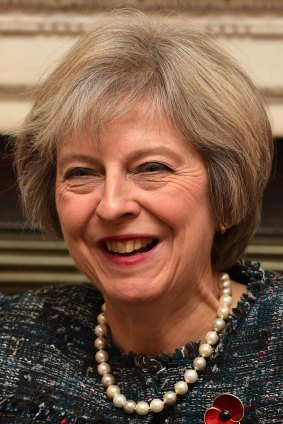 Pledge to serve families that are "just managing": British Prime Minister Theresa May.
